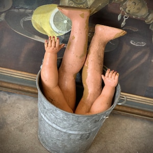 Vintage set creepy baby doll limbs in mini metal pail old composition salvaged doll parts creepy craft display
