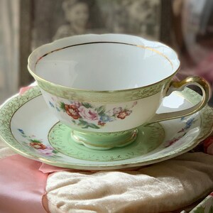 Vintage teacup and saucer Ucagco Japan porcelain pale green and gold floral tea cup