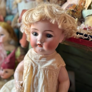 Antique German baby doll composition body porcelain head glass eyes