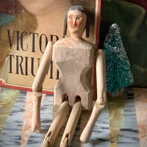 Antique hand carved doll painted wooden peg jointed small folk art primitive doll 8.75 inch tall