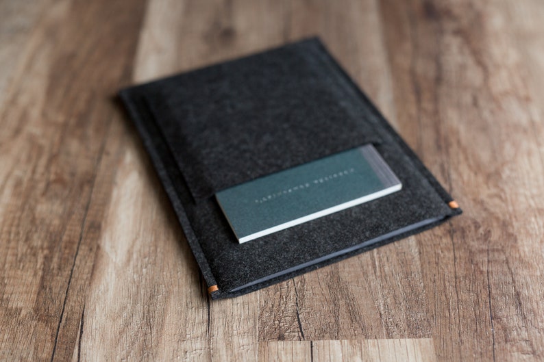 Kindle cover in dark grey, with field note pocket