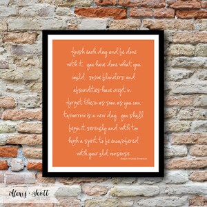 May include: A framed print with a black border features a vibrant orange background with white cursive text. The text is a quote by Ralph Waldo Emerson. The bottom left corner displays the text "Alexis Scott Designs".