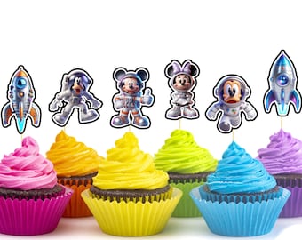 May include: A collection of cupcakes with colorful frosting and themed toppers. The toppers feature cartoon characters and a rocket ship. Cupcake colors include pink, orange, yellow, green, blue, and purple.