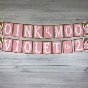 May include: Pink and brown banner with farm animal illustrations and the text "OINK  Moo  VIOLET is 2".