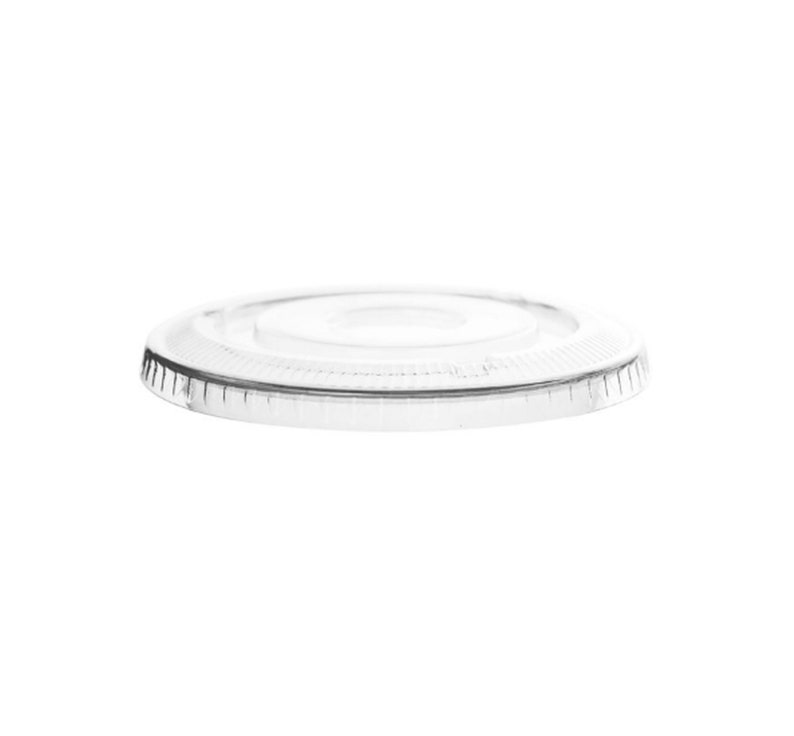May include: A clear plastic lid for a cup or container. The lid has a smooth, flat surface and a slightly raised edge around the perimeter.