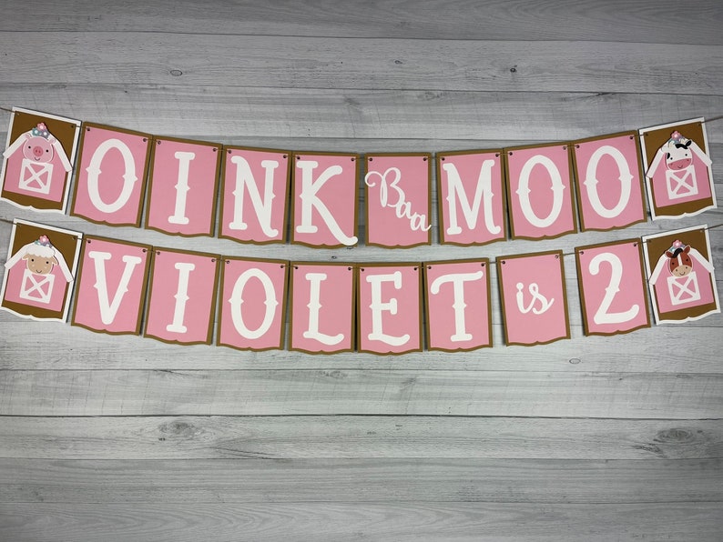 May include: Pink and brown banner with the text "OINK  Ba MO  VIOLET is 2" with farm animal illustrations.