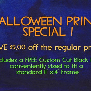 May include: A dark blue background with orange text that reads "HALLOWEEN PRINT SPECIAL!". Below, green text states "Includes a FREE Custom Cut Black Mat conveniently sized to fit a standard 11' x14' Frame."