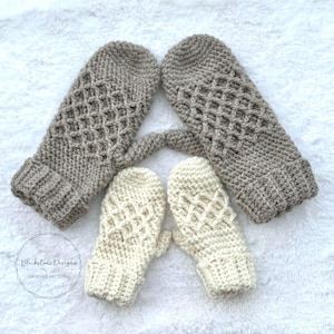 May include: Two pairs of crocheted mittens, one pair in beige and one pair in white. The mittens have a diamond pattern and are made with a soft yarn.