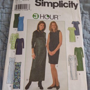 May include: A Simplicity 7901 sewing pattern envelope for dresses in sizes 12, 14, and 16. The front features illustrations of five dress variations labeled A through E, showcasing different lengths, sleeve styles, and fabric patterns in various colors.