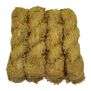 May include: Four skeins of mustard yellow yarn arranged side by side. Each skein features a highly textured, fringed, or eyelash-style construction with numerous fine, loose strands creating a dense, fuzzy appearance throughout the entire surface.