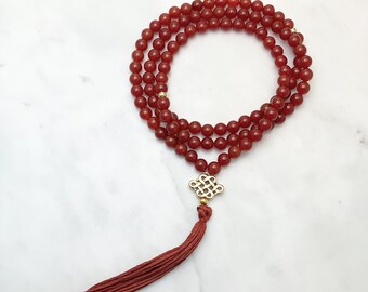 Mala de cornalina, collar de 108 cuentas con nudo budista infinito, piedras preciosas para la creatividad, la pasión y la sanación.
