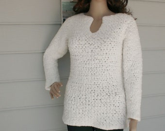 Creamy White knitted sweater with long sleeves and open keyhole style neckline.  Small size