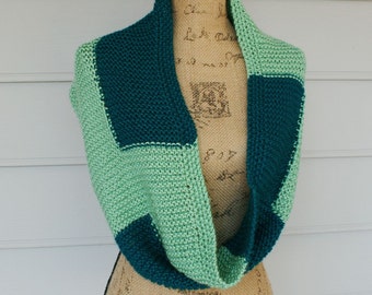 This infinity cowl is color blocked with turquoise and celery green.  Wear it long or wrapped or over your shoulders.