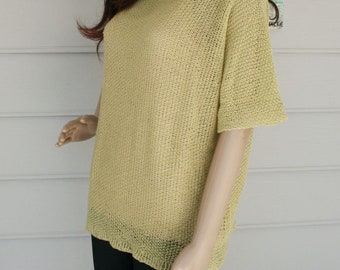 Hand knitted tee thats airy and light.  A great chartreuse color that goes from day to night.