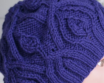 Toboggan or Slouchy Hat for the winter season.  A beautiful intricate pattern made with blue wool yarn
