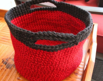 Basket and or Tote.  This adorable hand chrocheted basket is made with tones of red with a black band.  (Items in tote not included)