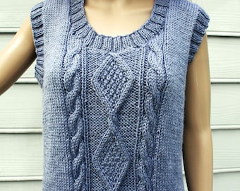 Sweater vest made with the softest yarn.  Looks great as is, or layered with a cool white shirt.  Unisex size Womens L, XL or Mens  S, M