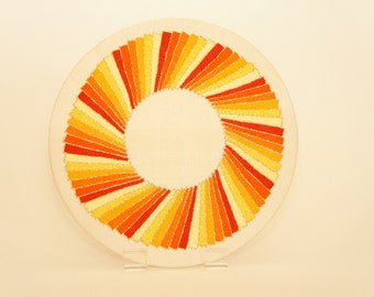 Sunburst embroidered roundel