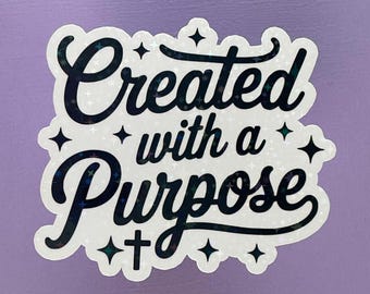 Pegatina de 3" con la frase "Creado con un propósito".
