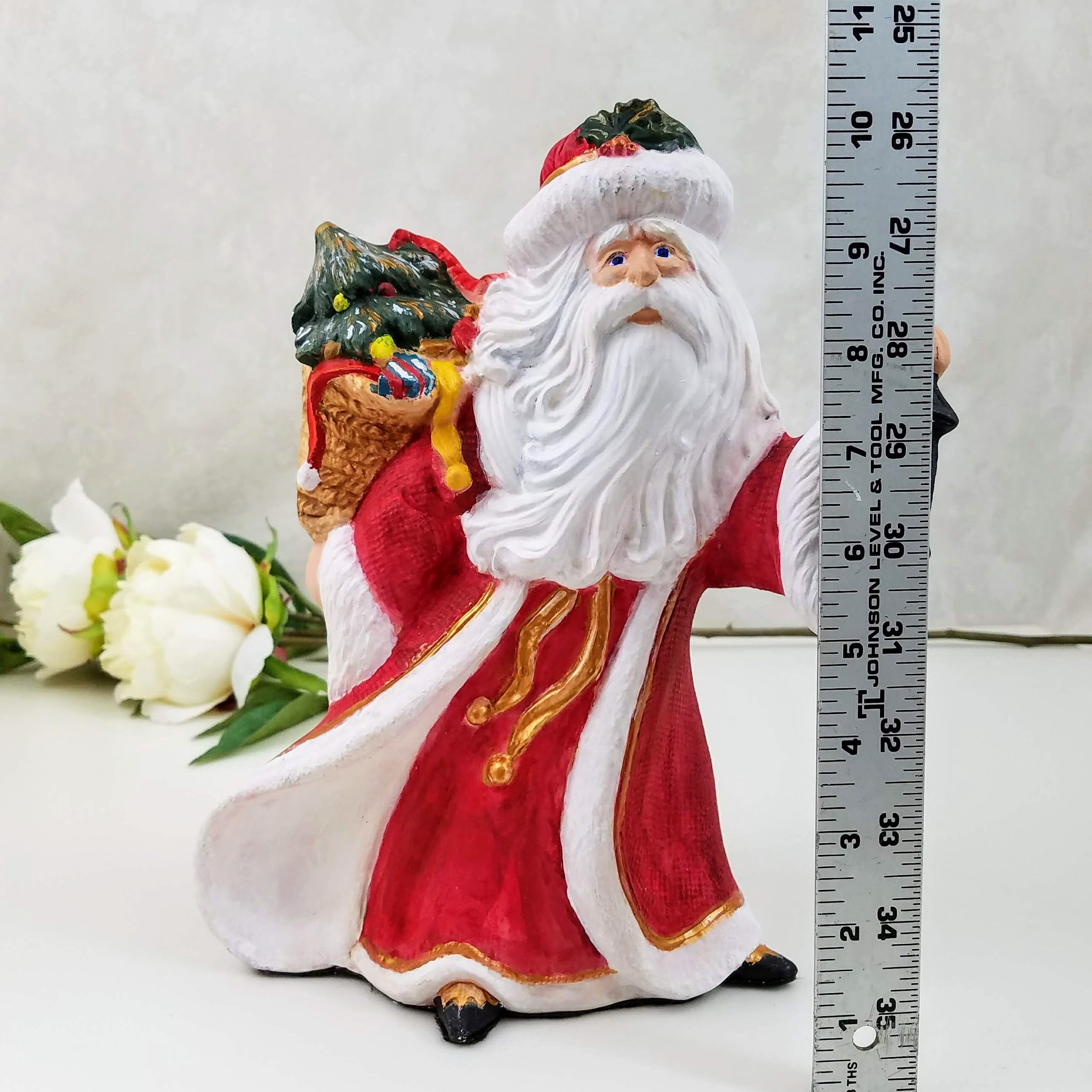 santa figurines from different countries