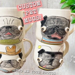 May include: Three ceramic mugs with custom pug illustrations. The mugs are white with black and gray pug faces, and each mug has a different design. The text "CUSTOM PET MUGS!" is in a pink box at the top of the image. The text "SEND ME YOUR PHOTOS" is at the bottom of the image. The text "ready in 3 weeks!" is in the lower right corner of the image.
