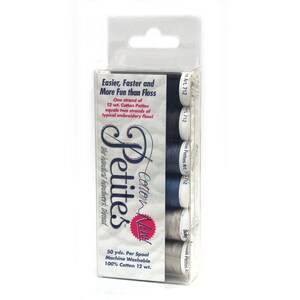 May include: A package of six spools of Cotton Petite embroidery thread in shades of blue and gray. The package is labeled "Cotton Petites" and "the handiest handwork thread". Each spool is 50 yards and machine washable. 100% cotton 12 wt.