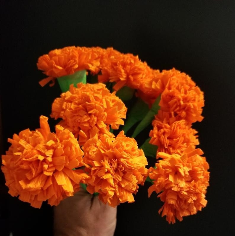 Top 94+ Images what are the orange flowers in dia de los muertos Excellent