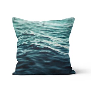 A vibrant coastal accent for your beach style interior settings, our square accent throw pillow features a blue green ocean water design on both sides! Available in several different pillow sizes to choose from.