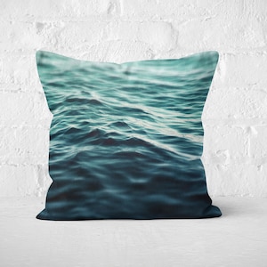 A vibrant coastal accent for your beach style interior settings, our square accent throw pillow features a blue green ocean water design on both sides! Available in several different pillow sizes to choose from.