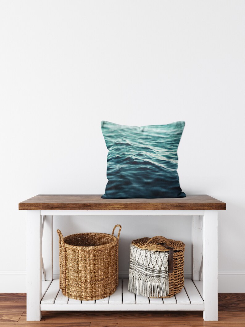 A vibrant coastal accent for your beach style interior settings, our square accent throw pillow features a blue green ocean water design on both sides! Available in several different pillow sizes to choose from.