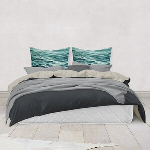 A vibrant coastal accent for your beach style interior settings, our square accent throw pillow features a blue green ocean water design on both sides! Available in several different pillow sizes to choose from.