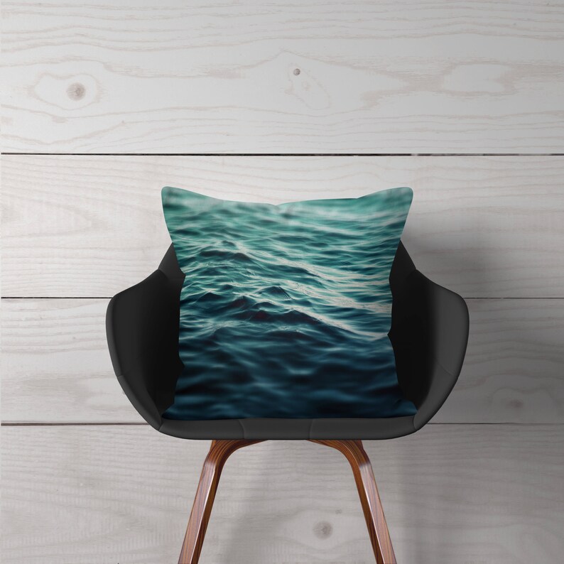 A vibrant coastal accent for your beach style interior settings, our square accent throw pillow features a blue green ocean water design on both sides! Available in several different pillow sizes to choose from.