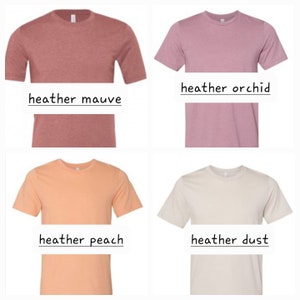 May include: Four t-shirts in different heather colors: heather mauve, heather orchid, heather peach, and heather dust.
