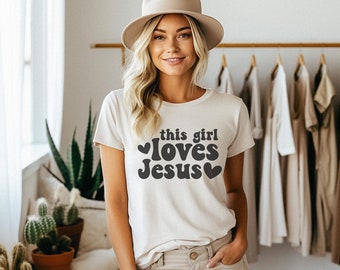 T-shirt This Girl Loves Jesus: kleding van het christelijke geloof