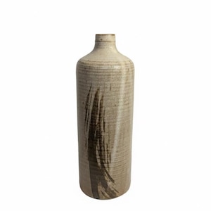 May include: A tall, cylindrical ceramic vase with a narrow neck. The vase is a light beige color with horizontal textured lines and a dark brown brushstroke design. The vase is suitable for home decor.