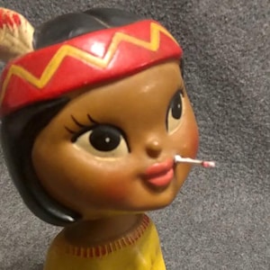 baby smoking a cigarette bobblehead from deathgasm Cheech and Chong Neca 7.5" Up In Smoke Head Knockers Pedro Marin Baby smoking a cigarette -