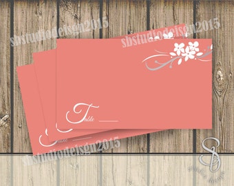 floral wedding place cards in coral