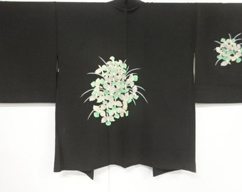 A Vintage Japanese Kimono Haori 100% silk black with light green and white blossoms lined in ochre satin