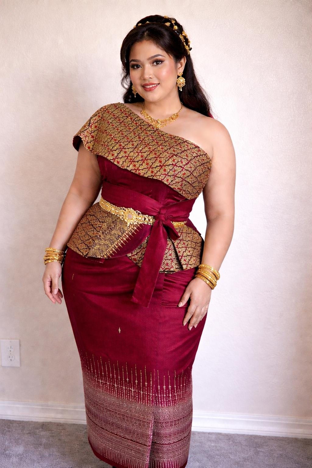 modern cambodian dress Adorned in the glorious allure of a red Cambodian dress, I gracefully move to life's melody with profound gratitude. Wearing this dress is a regal experience reminiscent of the intense emotions
