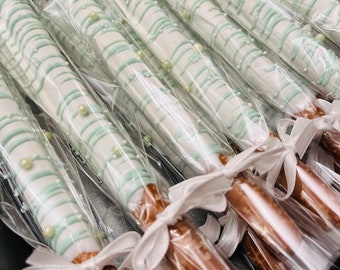 Chocolate Dipped Pretzel Sticks. Chocolate Color can be customized. Ribbon is not included. Request Ribbon before ordering.