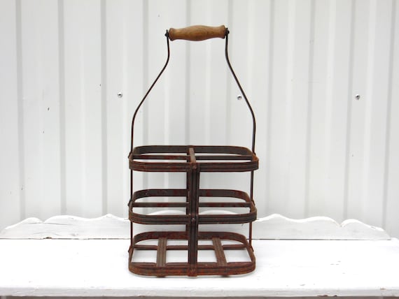 Ancien Porte bouteille en fer pour 4 bouteilles