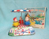 Near Mint Vintage tin toy FUNLAND CUP RIDE Battery Operated Kanto Japan