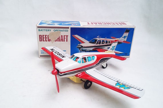 vintage tin toy airplanes