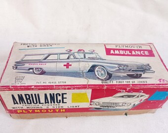 Vintage Ichiko Japan Tin Toy: 1961 Plymouth Ambulance Station