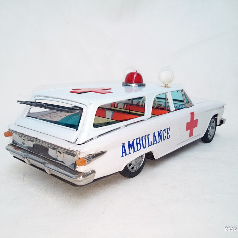 Vintage Ichiko Japan Tin Toy: 1961 Plymouth Ambulance Station