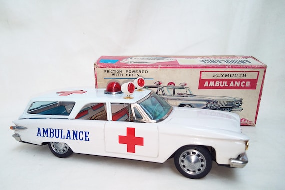 Vintage Ichiko Japan Tin Toy: 1961 Plymouth Ambulance Station