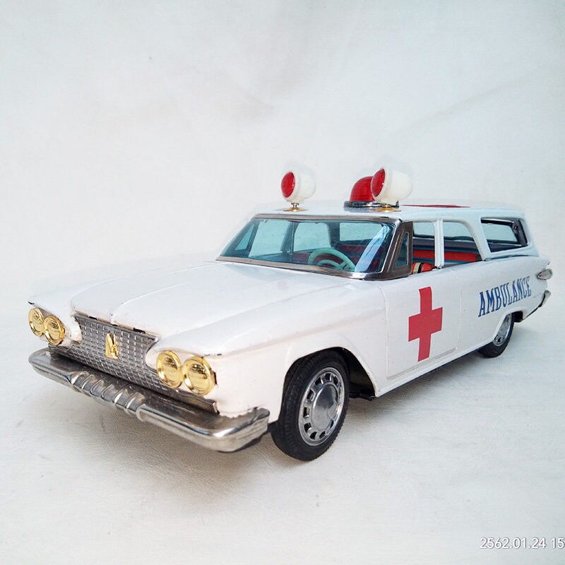 Vintage Ichiko Japan Tin Toy: 1961 Plymouth Ambulance Station