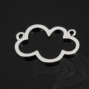 May include: Silver metal cloud charm with two jump rings. The charm is a simple outline of a cloud.