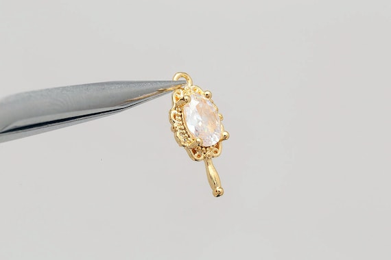 K1064-2ea/20ea-gold Plated-15*6.5mm Tiny CZ Hand Mirror K1064-2ea/20ea-gold Plated-15*6.5mm Tiny CZ Hand Mirror