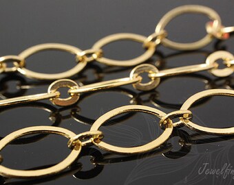 May include: Three gold chains with different link styles. The chains are made of oval and round links.
